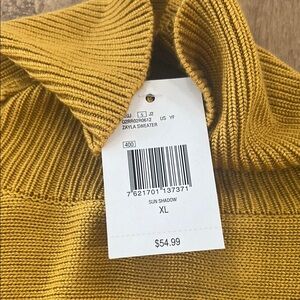 Guess mustard yellow sweater XL. Fits like a medium.